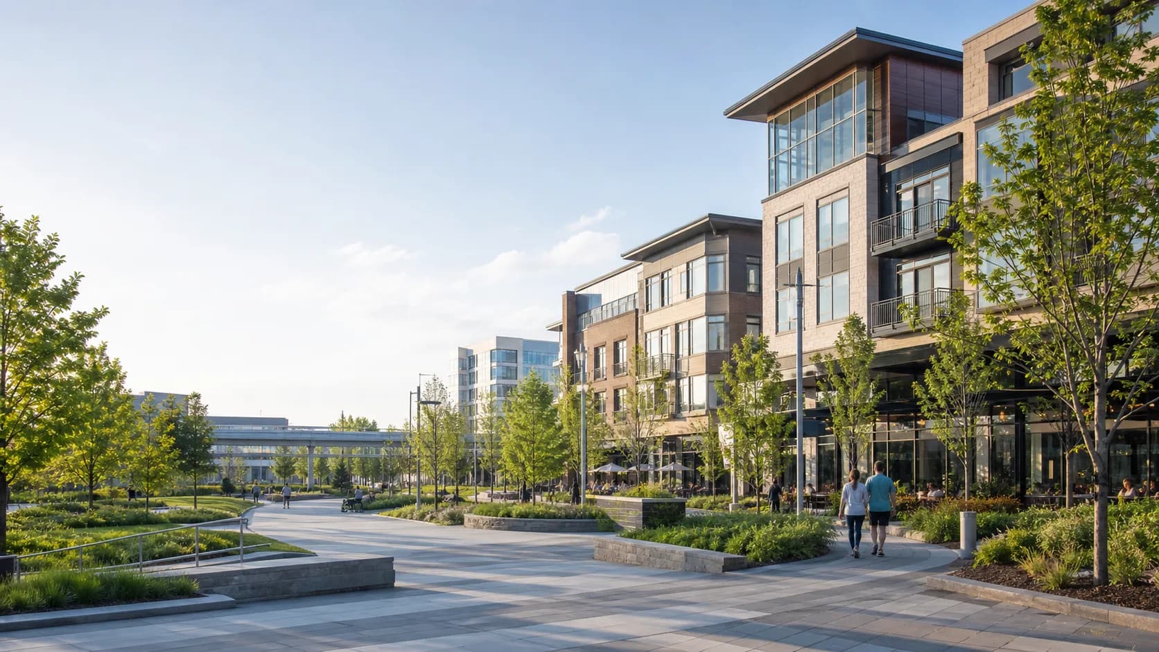 Modern mixed-use neighborhood and broad pedestrian path representing Ashburn, Virginia