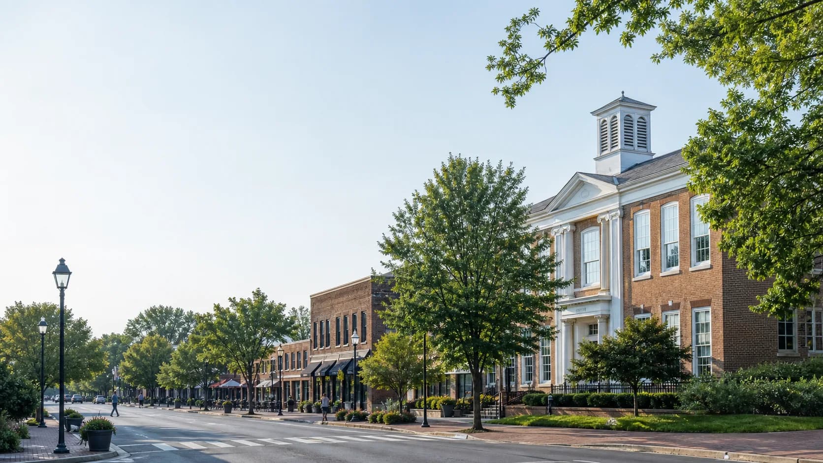 Quiet brick civic and commercial streetscape in Fairfax, Virginia on a clear morning